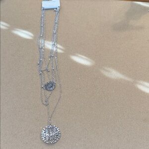 Elegant Silver Necklace with Intricate Pendant